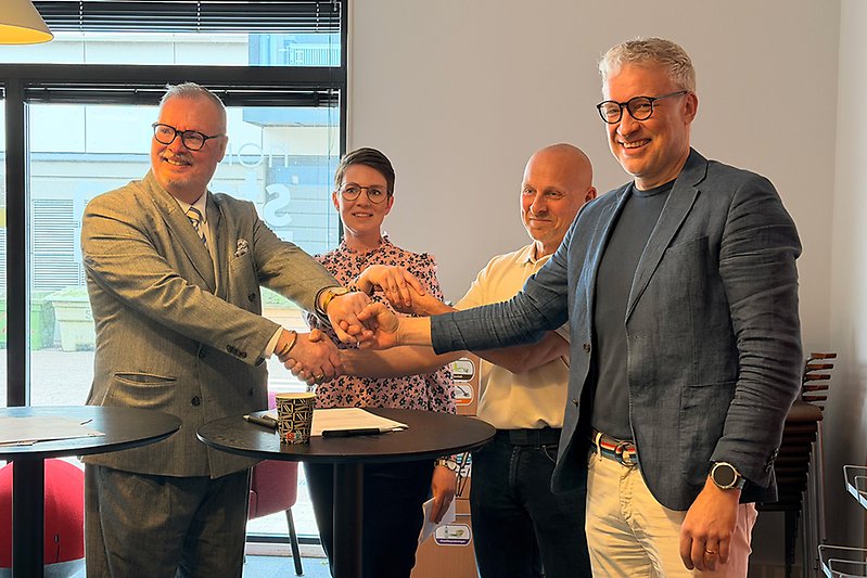 Hässleholmslöftet handskakning